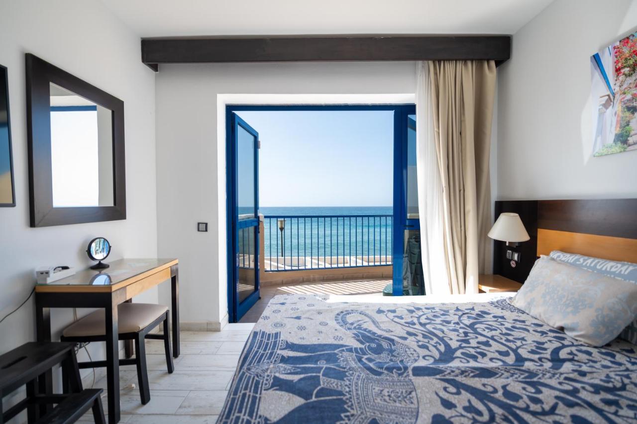 Apartamentos Playa Feliz 普拉亚戴尔雷安格莱斯 外观 照片