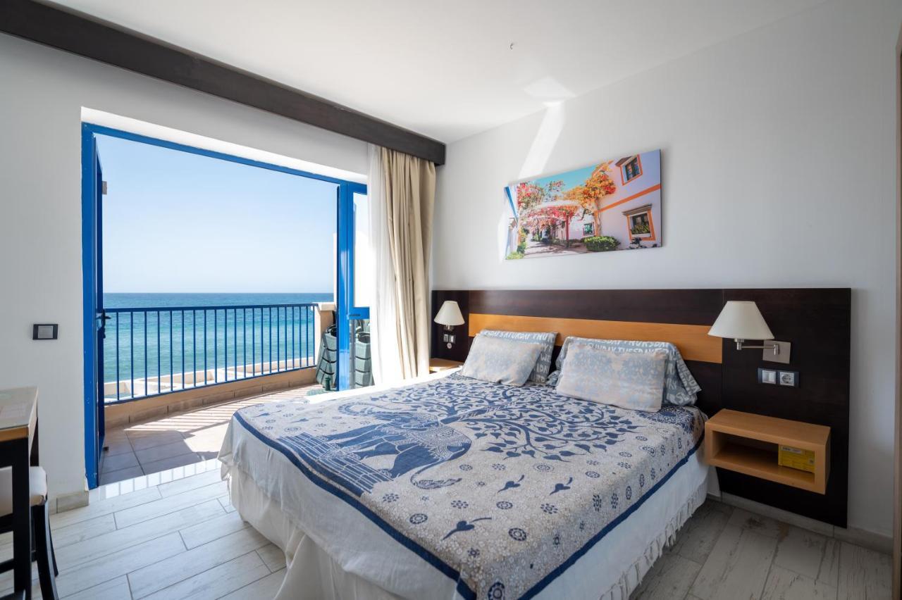 Apartamentos Playa Feliz 普拉亚戴尔雷安格莱斯 外观 照片