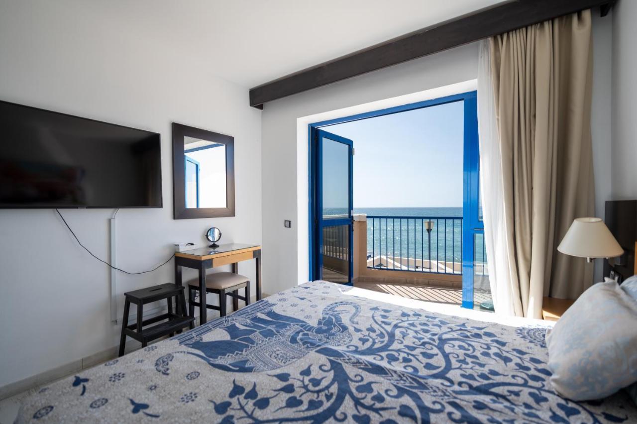 Apartamentos Playa Feliz 普拉亚戴尔雷安格莱斯 外观 照片